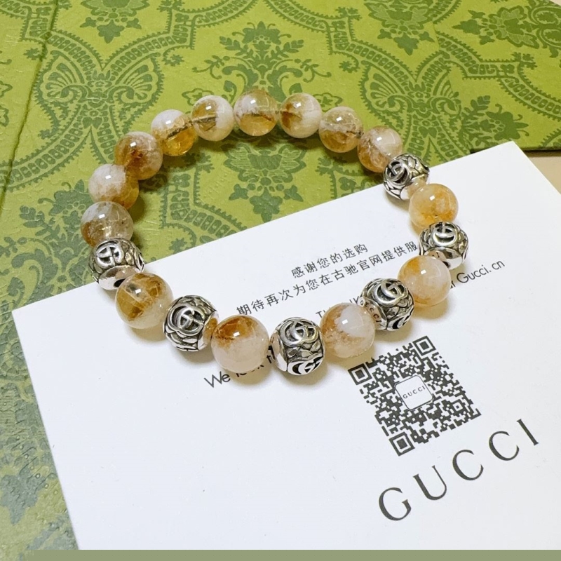 G*u*i bracelets